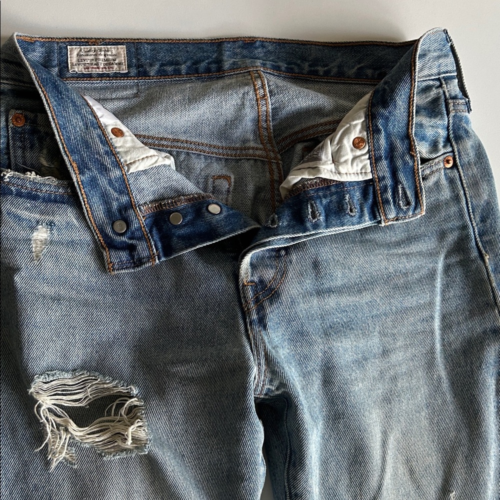 Distressed Blue Denim Jeans